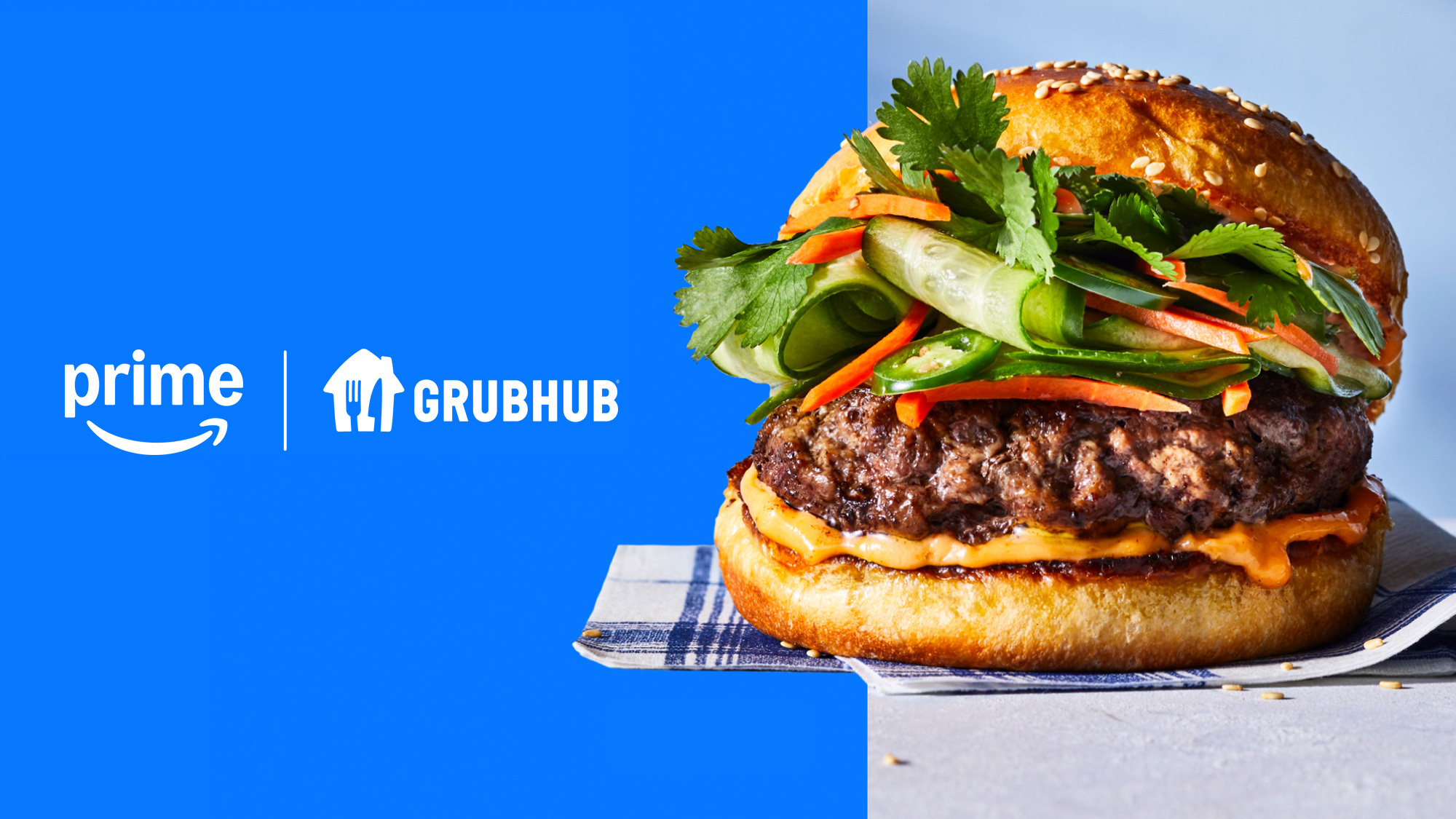 An image of a hamburger with text that reads: Prime GrubHub.